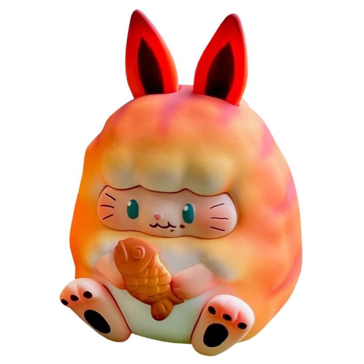 Bunny May Orange Cat Sitting