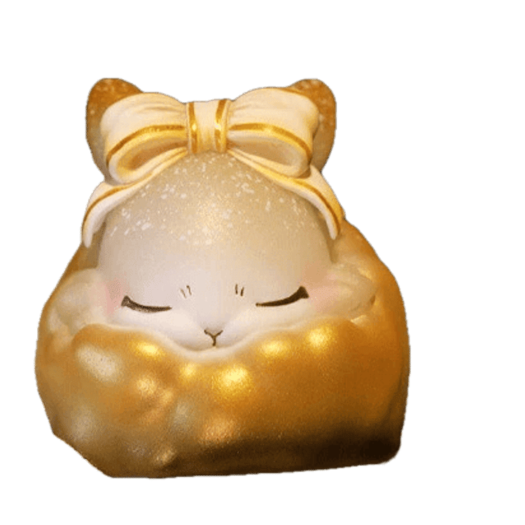 Golden Christmas Cotton Ball Raby by Yoyo Yeung