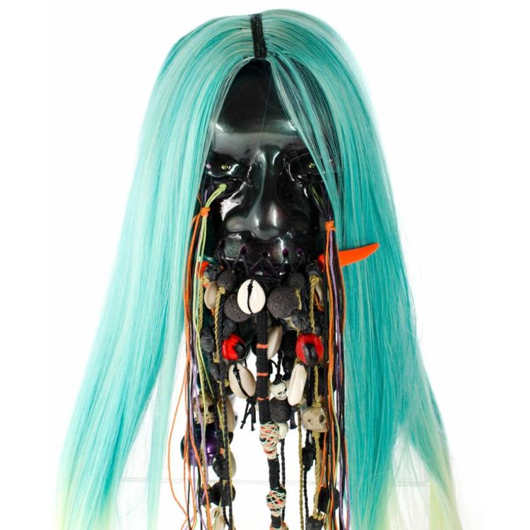 Shrunken Head (Black) by Carlos Enriquez Gonzalez