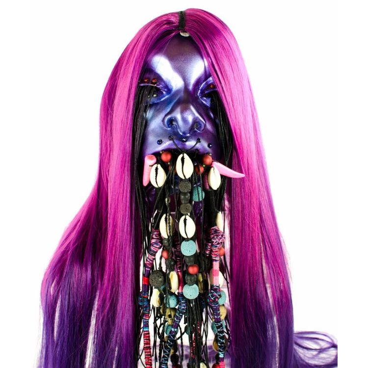 Shrunken Head (Purple) by Carlos Enriquez Gonzalez