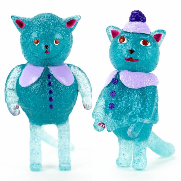Sweater Cat and Poncho Cat – Clear blue glitter GID set. by Grumble Toy (Ainsley Sturko)