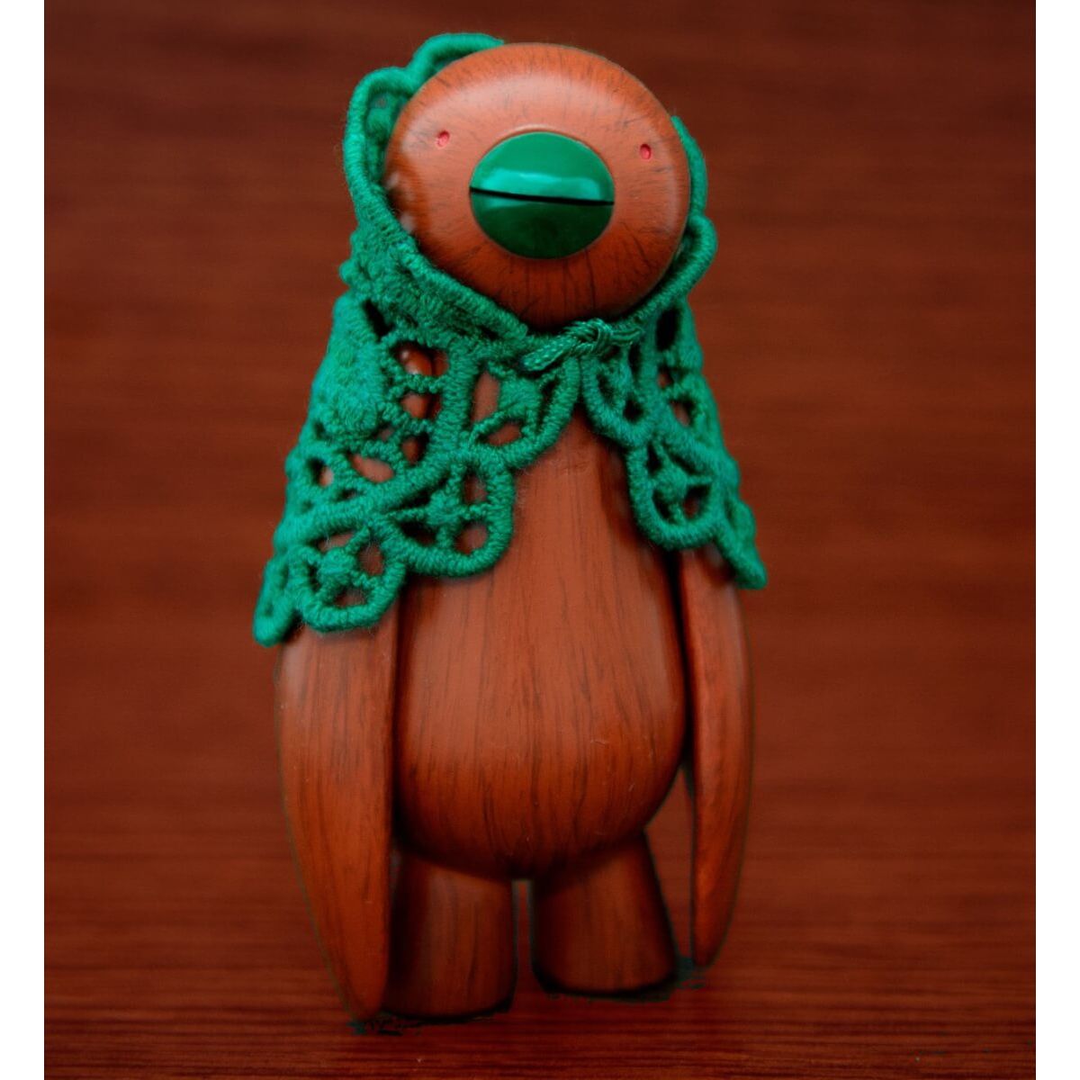 the mulled ji ja - wood effect body with Green scarf