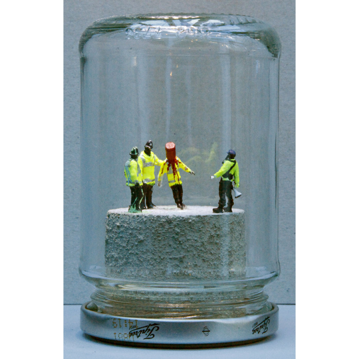 RED EXTINGUISHER on Policeman's Head