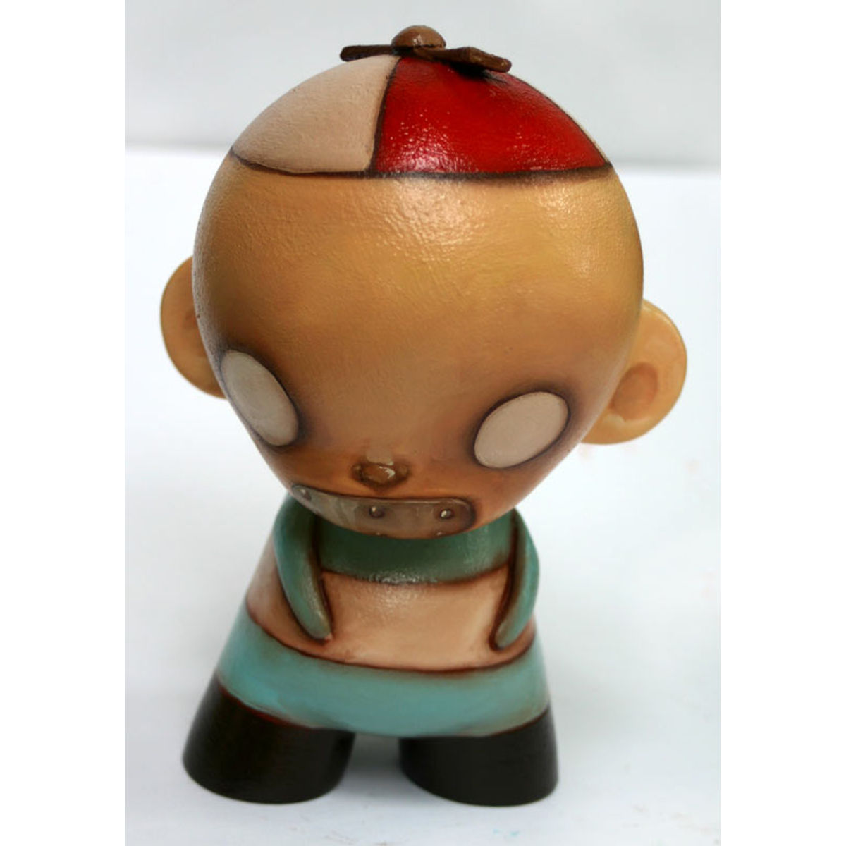 Boy with bolted smile, striped shirt