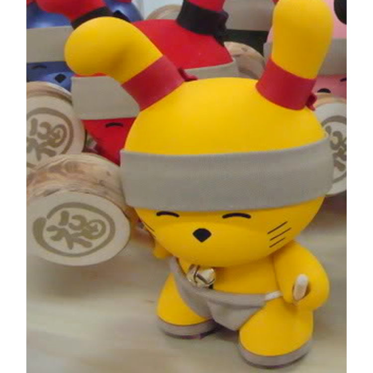 Lucky Taiko (yellow) by Huck Gee