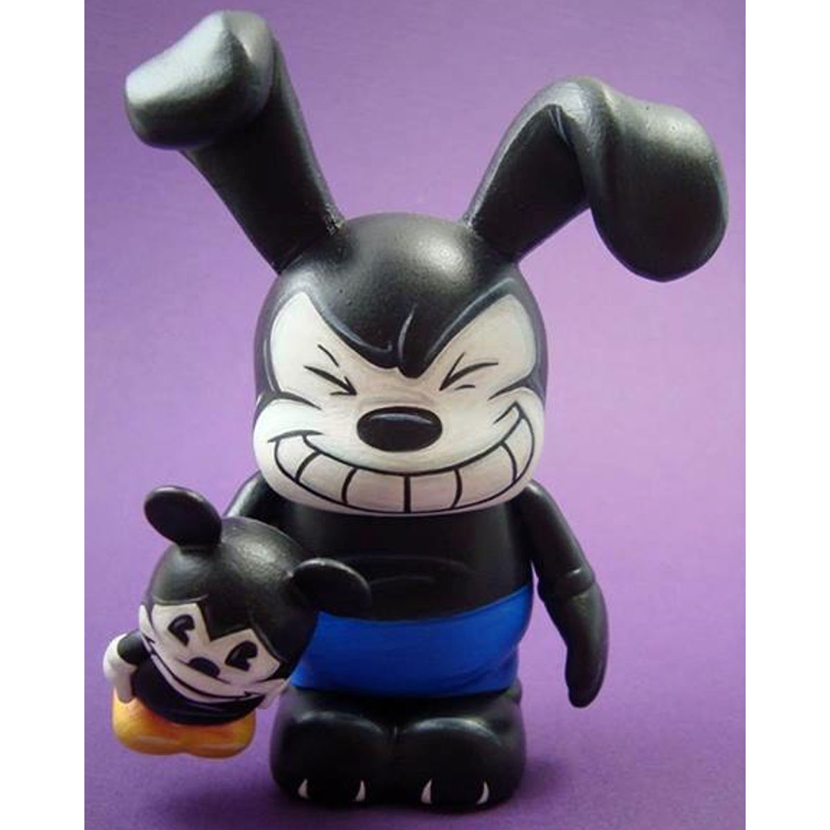 Oswald the puppet master with Mickey