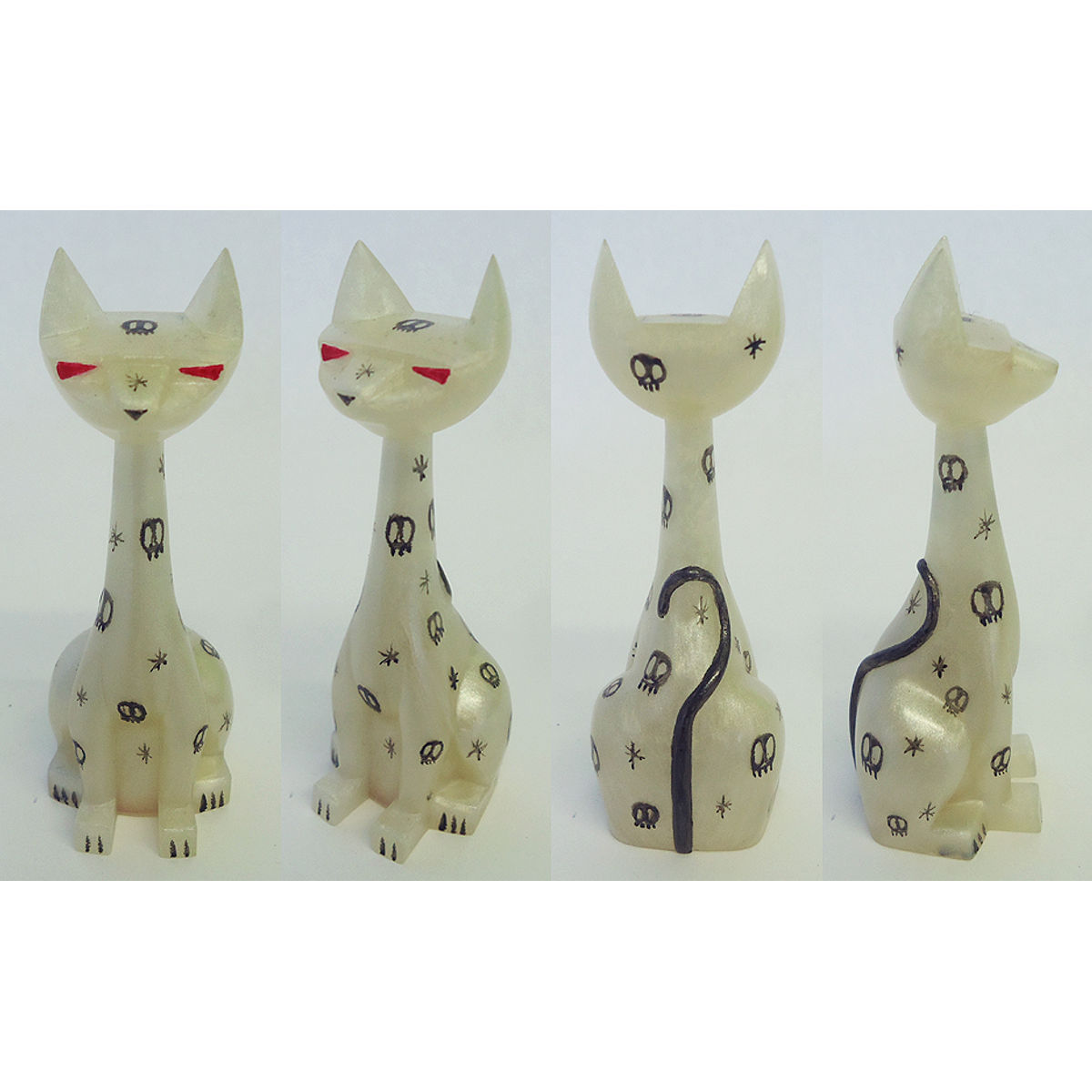 PEARL CAST SKULL CAT TUTTZ - milky/red eye