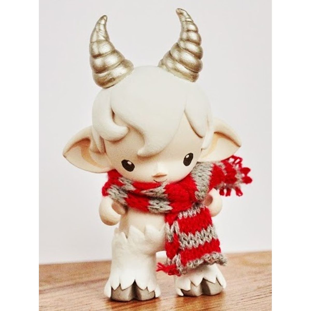 faun in white - golden horns