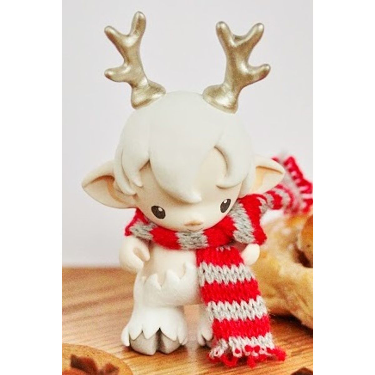 faun in white - golden antlers