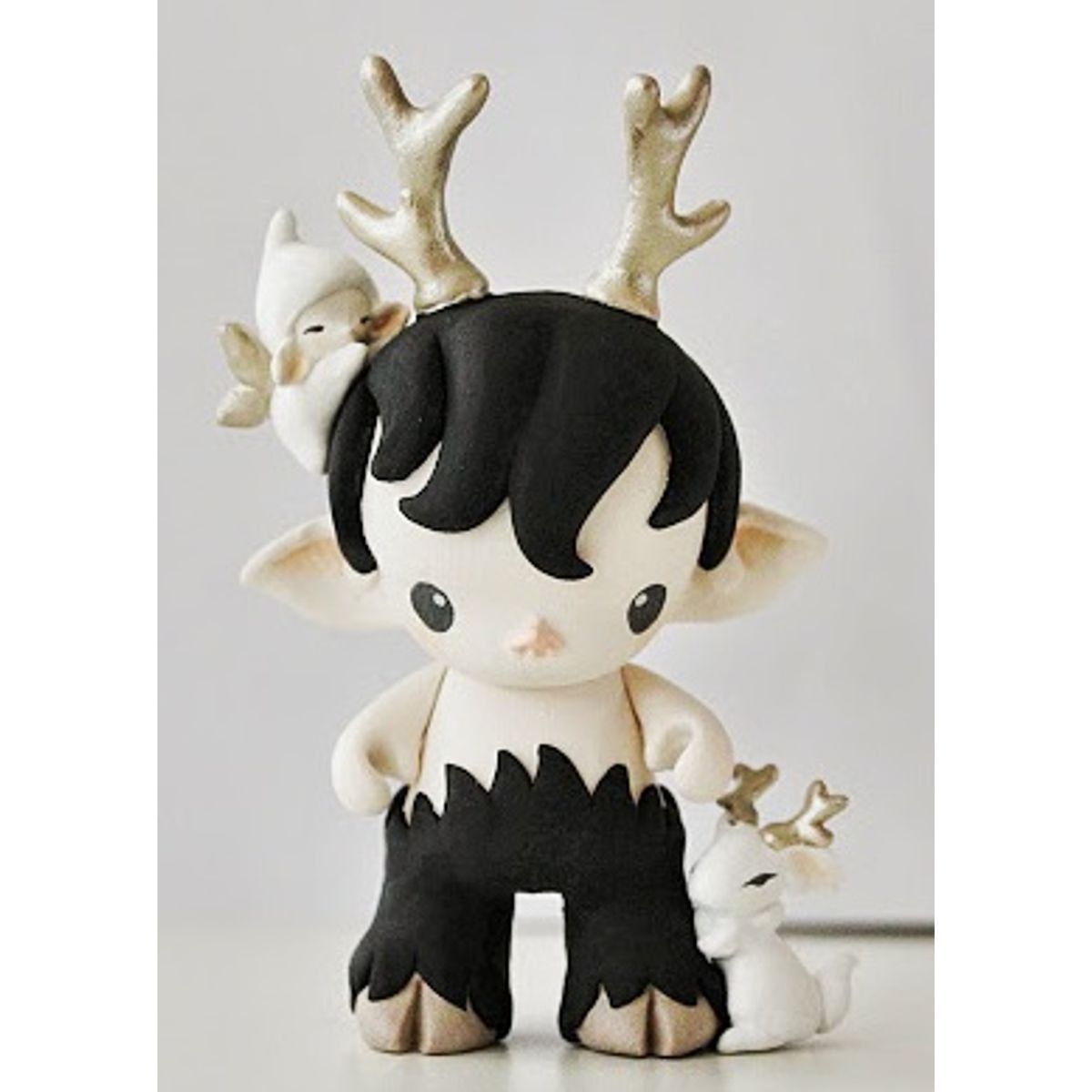 faun in black with elf and jackalope bunny