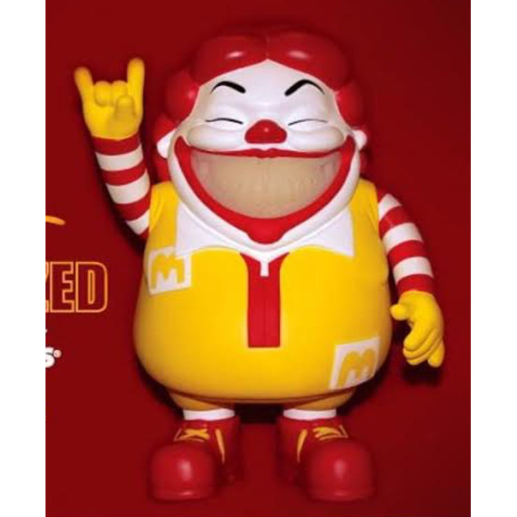 MC Supersized Grin - GID Grin by Ron English
