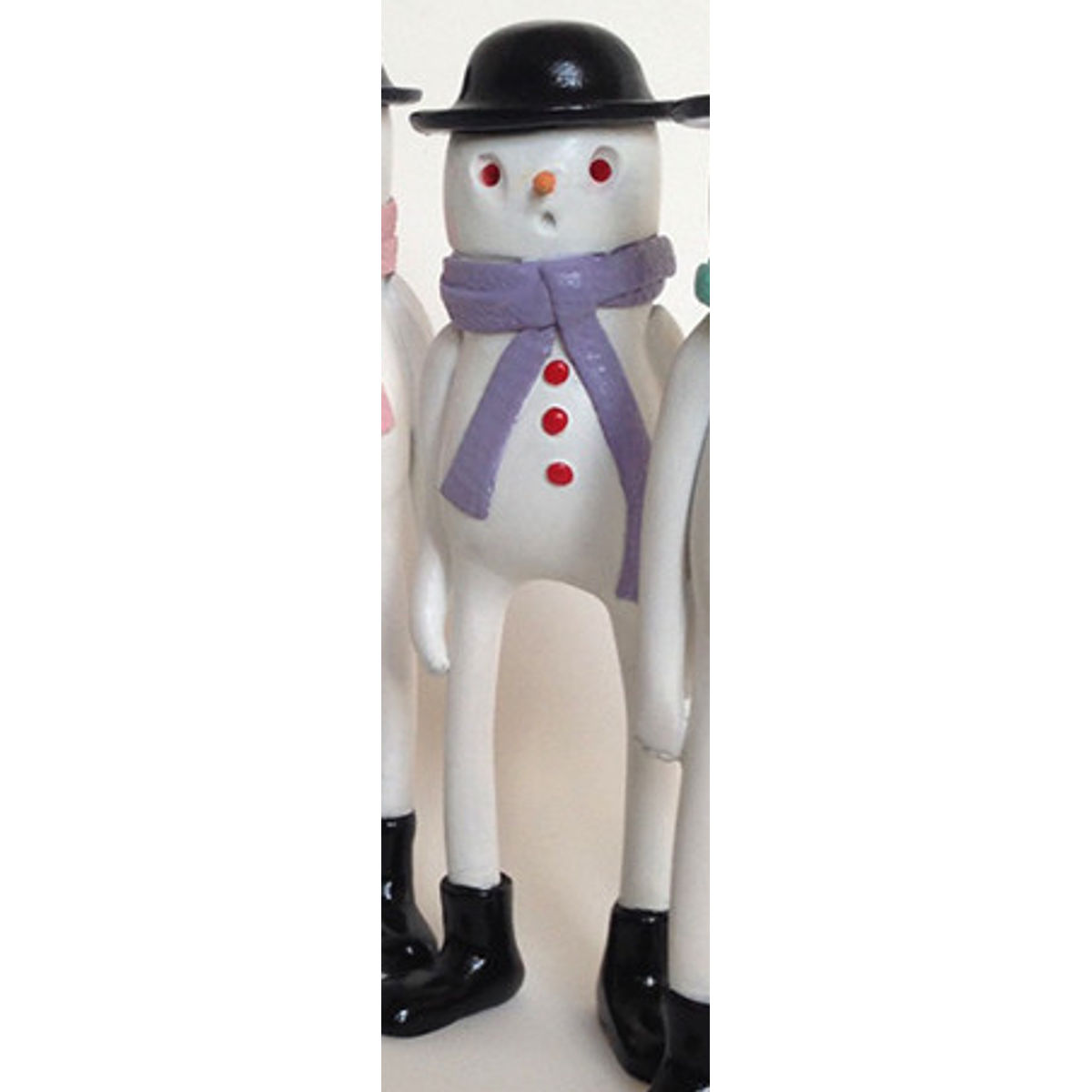 Snowman with purple scarf