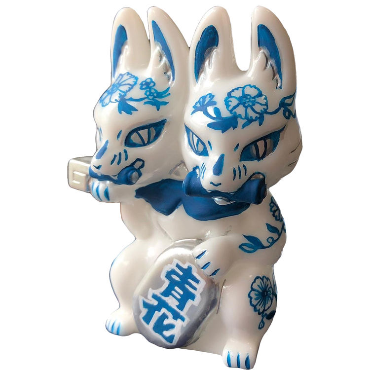 BLUE AND WHITE PORCELAIN TWO-HEADED FOX by Genkosha